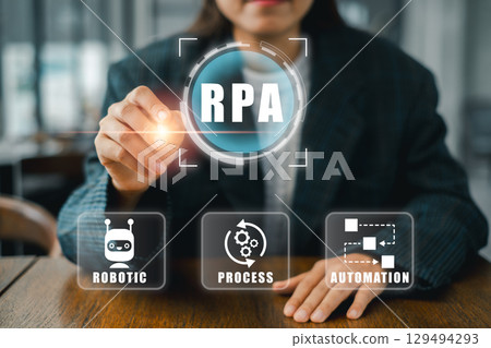 Futuristic RPA interface showcasing robotic process automation in a business setting, highlighting innovation and efficiency. 129494293