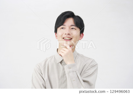 Man in his 20s, imagine, white background 129496063