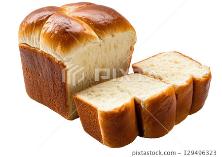 Soft and fluffy brioche bread loaf with golden crust, sliced to reveal its airy texture 129496323