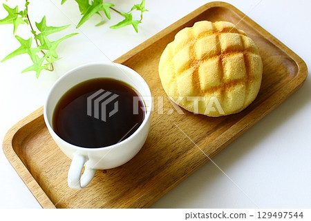 Hot coffee and melon bread 129497544