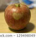 Heart-shaped apple 129498049