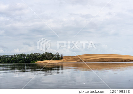 Dunes and lagoons of Vassouras, Lencois Maranhenses, Barreirinhas in Brazil. White sand dunes with pools of fresh water Dunes and lagoons of Vassouras, Lencois Maranhenses, Barreirinhas in Brazil. White sand dunes with pools of fresh water 129499328