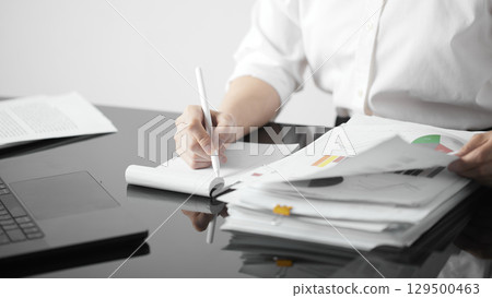 Business concept. A confident gesture by a female leader with leadership and innovative attitude. 129500463