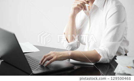 Business concept. A confident gesture by a female leader with leadership and innovative attitude. Business concept. A confident gesture by a female leader with leadership and innovative attitude. 129500468