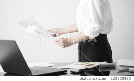 Business concept. A confident gesture by a female leader with leadership and innovative attitude. 129500480