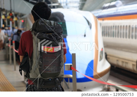 Backpackers using the Hokuriku Shinkansen 129500753