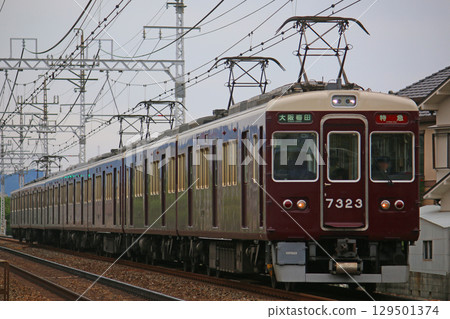 A train running on the Hankyu Kyoto Line A train running on the Hankyu Kyoto Line 129501374