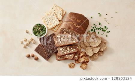 Assortment of diet breads including seed loaf for healthy eating, background 129503124