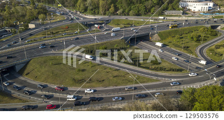 Road junction from the bridge to the freeway, black and white video. Road junction from the bridge to the freeway, black and white video. 129503576