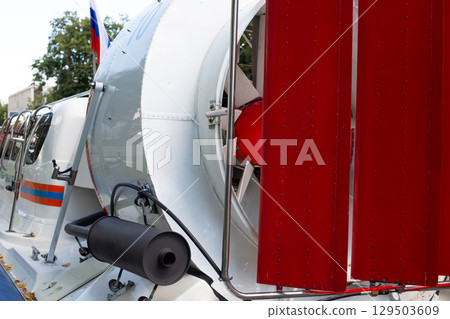 The rear part of the hovercraft rescue boat with large propeller screw for gaining speed and guides for turning. The fan on rear part of the boat as element for gaining speed. Unusual transport 129503609