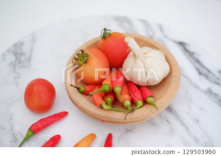 Cooking Ingredients with Red Chili, Garlic, and Tomato Cooking Ingredients with Red Chili, Garlic, and Tomato 129503960
