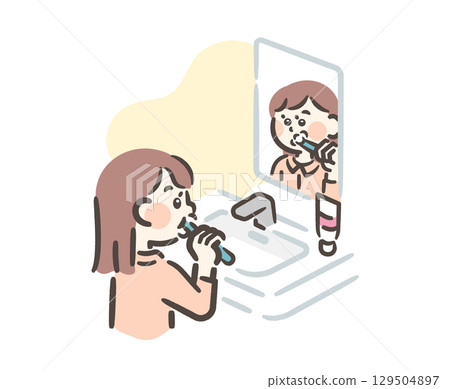 Girl brushing her teeth in the bathroom 129504897