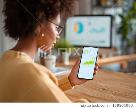 woman using AI finance app to manage budget visually woman using AI finance app to manage budget visually 129505090