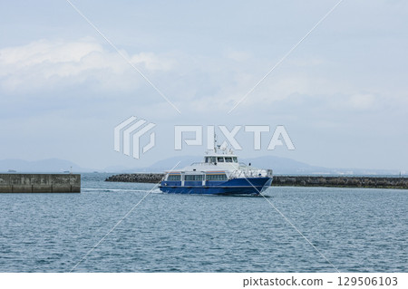 A high-speed ferry entering Kohama Port on Kohama Island A high-speed ferry entering Kohama Port on Kohama Island 129506103
