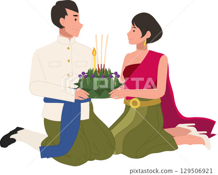 thai cultural festival scene with couple kneeling in traditional attire holding krathong for loy krathong celebration in thailand 129506921