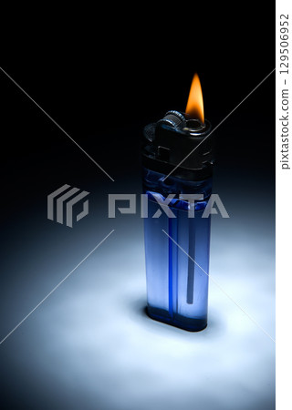 the inexpensive cigarette lighter with flame 129506952
