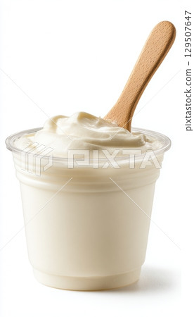 Dairy-Free Almond Yogurt Cup with Spoon on White Background 129507647