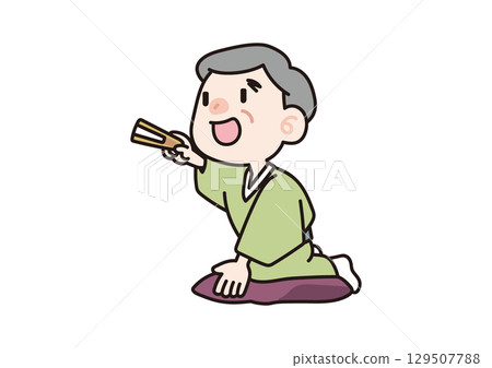 Rakugo performer pointing with a fan 129507788