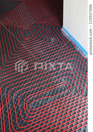 Tubes of radiant underfloor heating installation 129507806