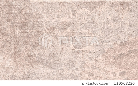 Beige grunge textured wall creating abstract background 129508226