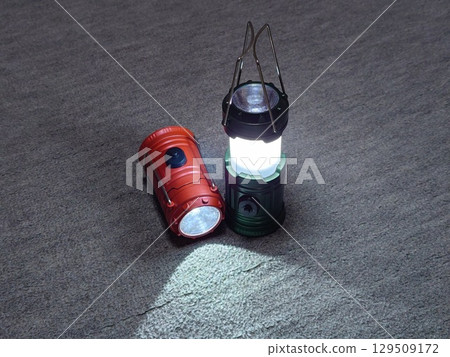 A lantern for use in emergencies (center) A lantern for use in emergencies (center) 129509172