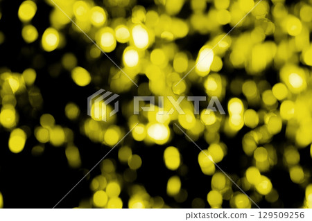 Yellow sparkling background material (stock photo) 129509256