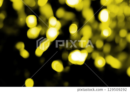 Yellow sparkling background material (stock photo) 129509292