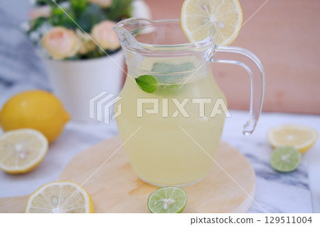 Fresh Lemonade in Glass Pitcher with Mint 129511004
