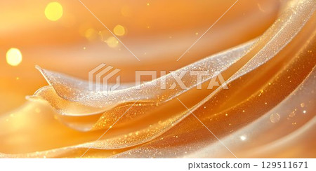 Gold background featuring soft, wavy textures with shimmering highlights showcasing an elegant and dreamy aesthetic that evokes warmth and luxury Gold background featuring soft, wavy textures with shimmering highlights showcasing an elegant and dreamy aesthetic that evokes warmth and luxury 129511671