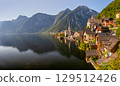 Hallstatt on Lake Hallstatt, a beautiful historic small town on the shore of a lake between mountains, Austria 129512426