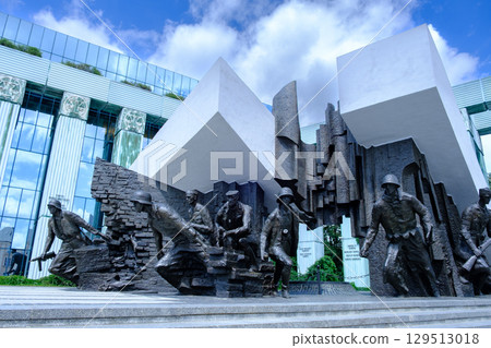 Warsaw Uprising Monument Bronze Tribute to Polish Resistance and Modern Backdrop Warsaw Uprising Monument Bronze Tribute to Polish Resistance and Modern Backdrop 129513018