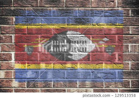 Eswatini Swaziland flag on a brick wall background Eswatini Swaziland flag on a brick wall background 129513358