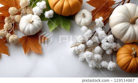 Colorful autumn leaves, pumpkins, and dried flowers create a charming fall decoration border, perfect for seasonal festivities 129514867