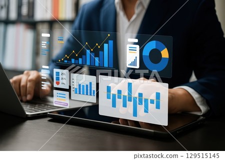 Modern digital dashboard with interactive financial graphs and statistical charts on a transparent interface. 129515145