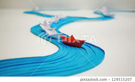 Row of paper boats are floating down a river, with one boat being red 129515207