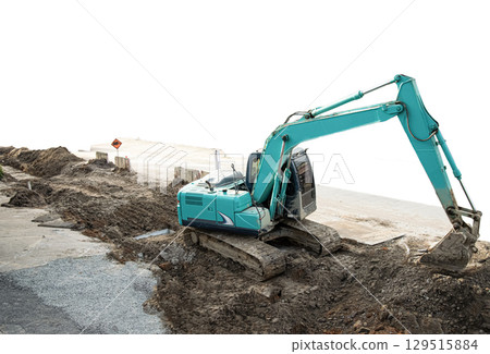 Top view of a large excavator working in a workplace, isolated on white background. Top view of a large excavator working in a workplace, isolated on white background. 129515884
