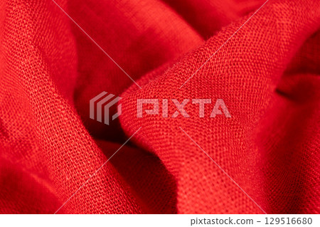Red Linen Fabric with Visible Fibers and Weave. Red Linen Fabric with Visible Fibers and Weave. 129516680