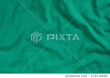 Close-Up of Abstract Green Emerald Cotton Textile Surface Top View Close-Up of Abstract Green Emerald Cotton Textile Surface Top View 129516698