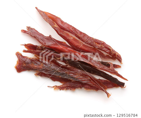 Top view of dried salted fish strips 129516784