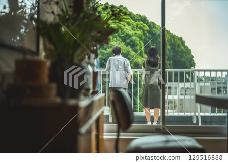 Men and women talking on the rooftop 129516888