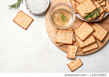 Olive oil salty crackers with rosemary 129516965