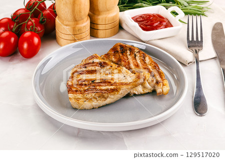 Grilled pork steak with sauce 129517020