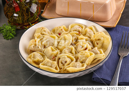 Russian homemade dumplings with meat 129517037