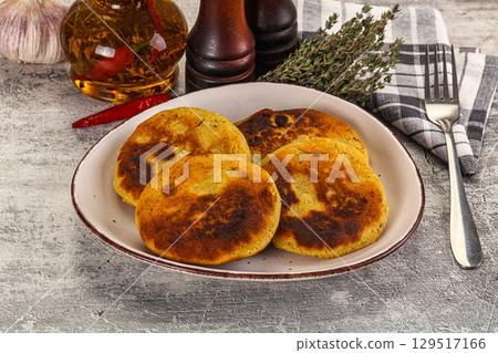 Georgian cuisine - Corn bread Mchadi Georgian cuisine - Corn bread Mchadi 129517166