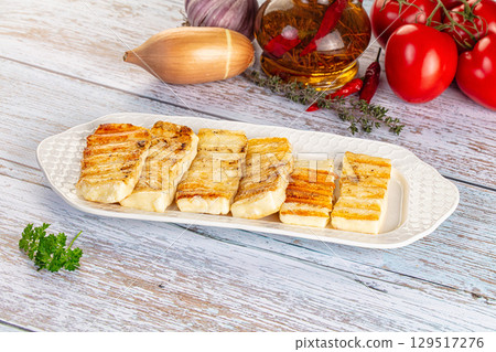 Greek traditional grilled halloumi cheese Greek traditional grilled halloumi cheese 129517276