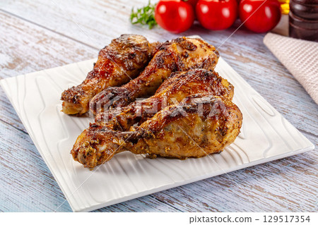 Baked chicken drumsticks with spices Baked chicken drumsticks with spices 129517354