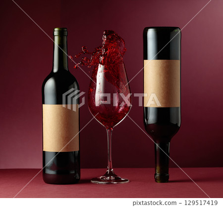 Red wine on a dark red background. Red wine on a dark red background. 129517419