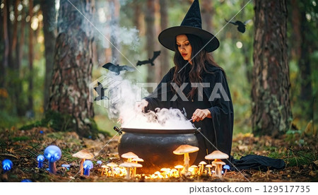 A woman in a black hat is sitting in front of a cauldron filled with smoke. The scene has a spooky and mysterious atmosphere A woman in a black hat is sitting in front of a cauldron filled with smoke. The scene has a spooky and mysterious atmosphere 129517735