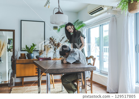 Rear view of a woman encouraging a man Rear view of a woman encouraging a man 129517805