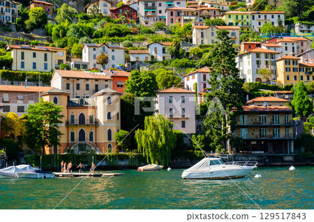 Multicolor houses building architecture on lake Como, Italy city. 129517843